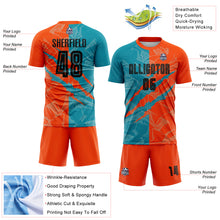 Load image into Gallery viewer, Custom Graffiti Pattern Black Teal-Orange Scratch Sublimation Soccer Uniform Jersey
