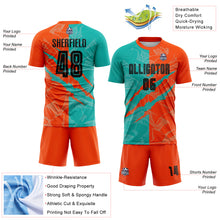 Load image into Gallery viewer, Custom Graffiti Pattern Black Aqua-Orange Scratch Sublimation Soccer Uniform Jersey
