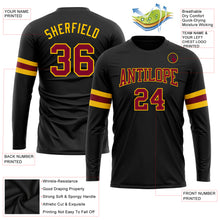 Load image into Gallery viewer, Custom Black Maroon-Gold Long Sleeve Performance T-Shirt

