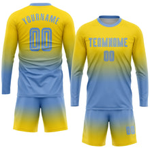 Load image into Gallery viewer, Custom Gold Light Blue Sublimation Long Sleeve Fade Fashion Soccer Uniform Jersey

